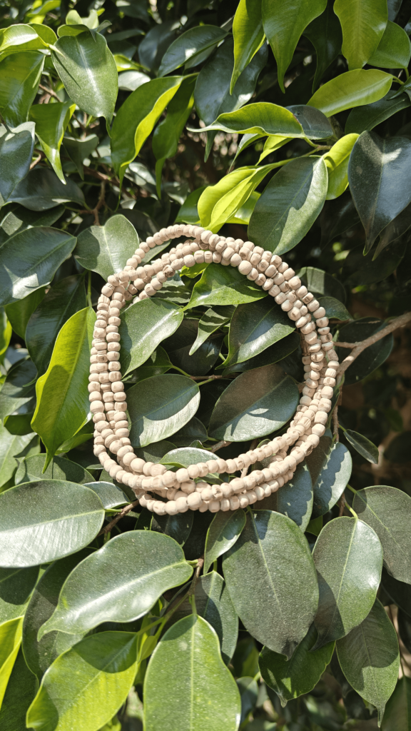 Sacred Tulsi Mala made from Tulsi wood beads, used for spiritual practices and meditation.